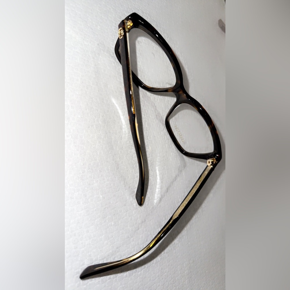 Gucci black and gold glasses